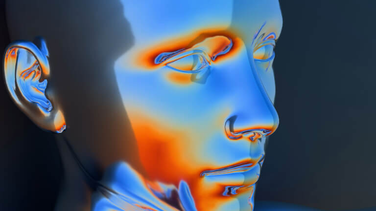 Trendy w grafice: Realizm 3D. Twarz modela 3D z mapami cieplnymi na twarzy.
